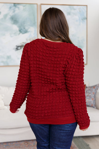 In Denial Bubble Pullover Sweater in Crimson